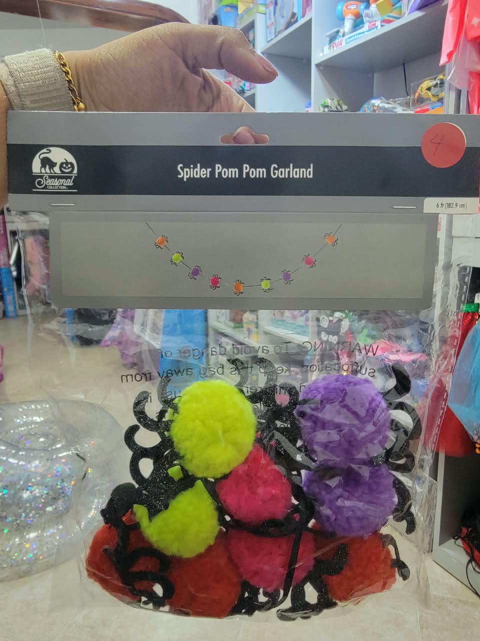 Guirnalda de arañas de pom pom de colores halloween
